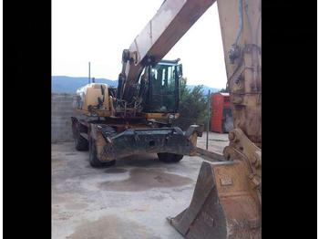 Wheel excavator Caterpillar: picture 1