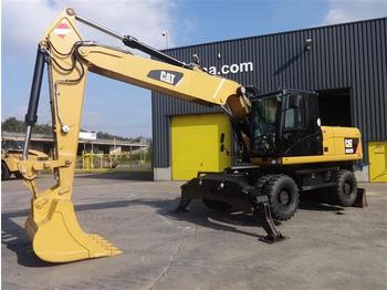 Wheel excavator Caterpillar M322D w blade and stabalisors (Ref 111172): picture 1