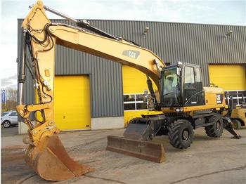 Wheel excavator Caterpillar M322 D w blade and stabilizers: picture 1