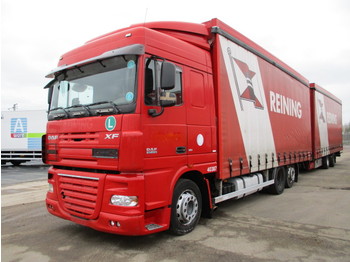 Curtainsider truck DAF XF 105.410 6X2: picture 1