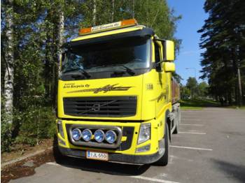 Skip loader truck Volvo FH12/FH13/FH 8x4 Tridem/VTA: picture 1