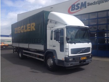 Container transporter/ Swap body truck Volvo FL618 4x2 borden/huif: picture 1