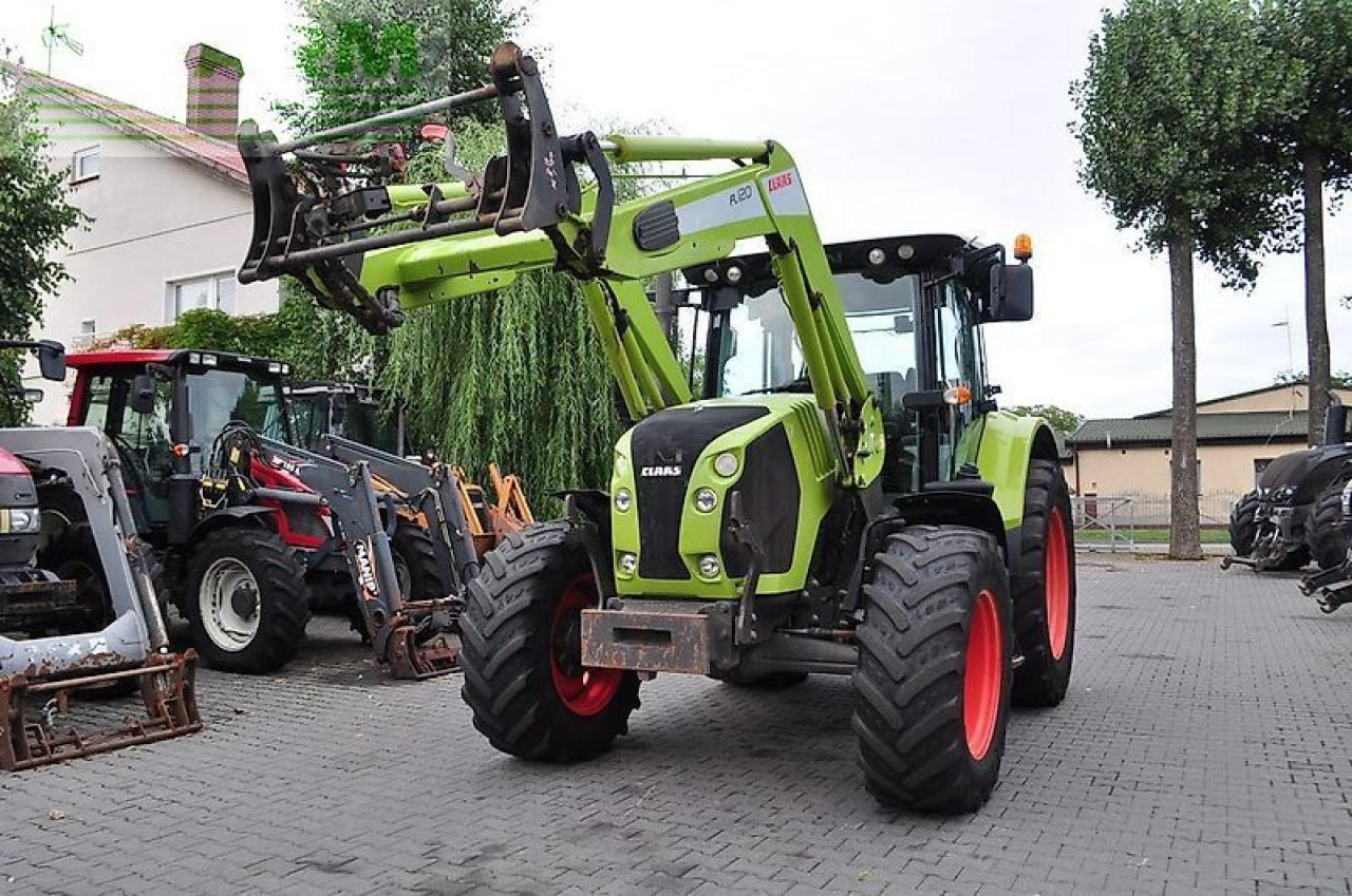 Farm tractor CLAAS arion 530 cis + claas fl120 CIS