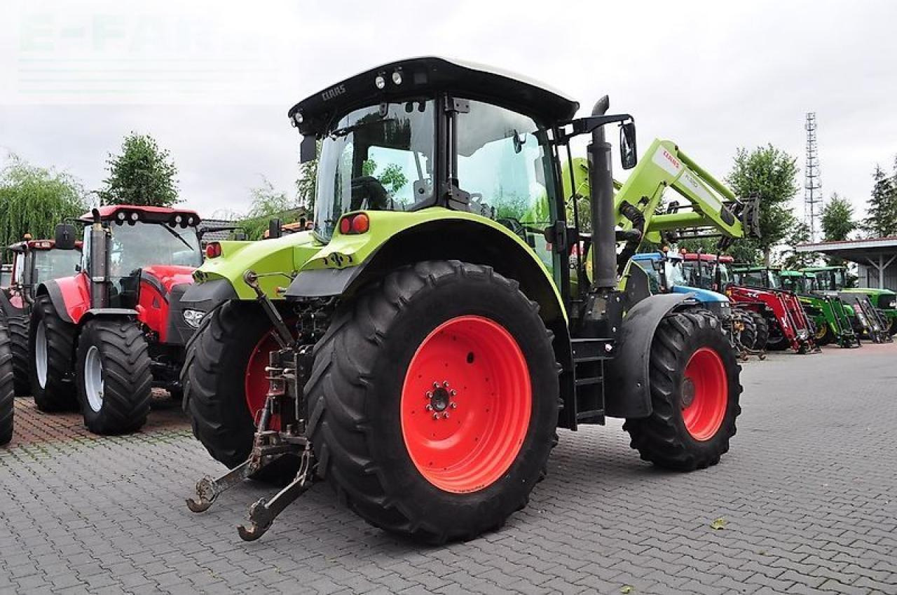 Farm tractor CLAAS arion 530 cis + claas fl120 CIS