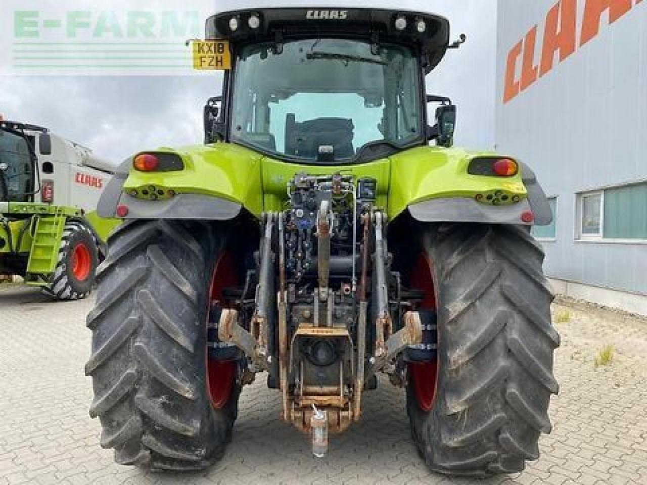 Farm tractor CLAAS axion 830