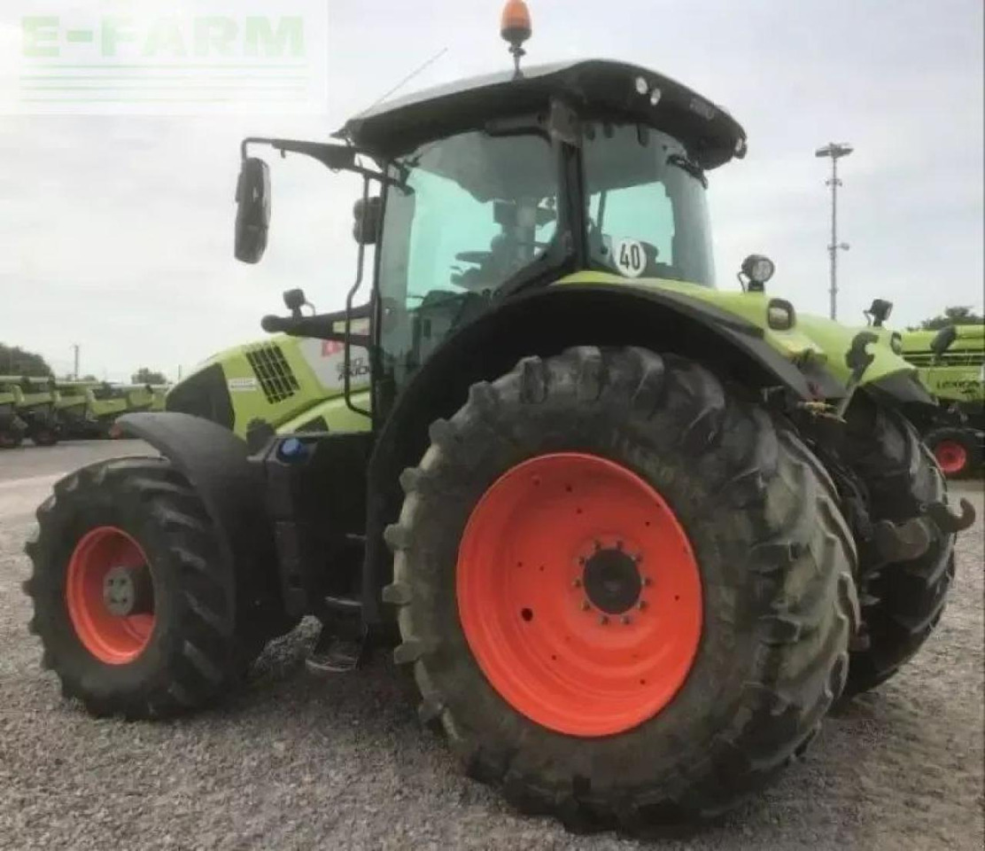 Farm tractor CLAAS axion 830