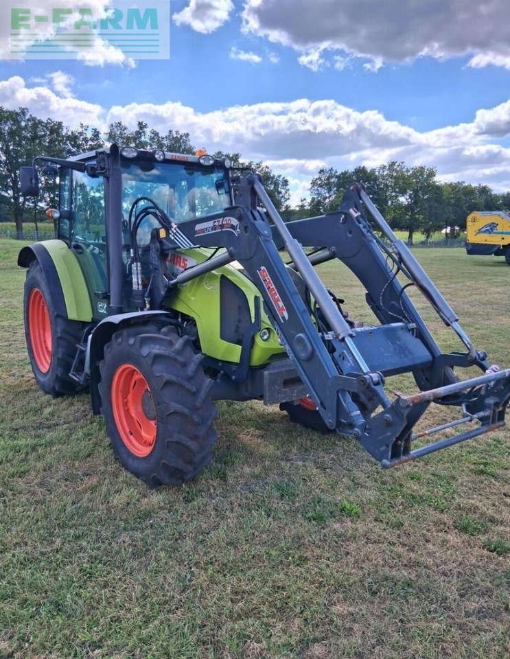 Farm tractor CLAAS axos 320