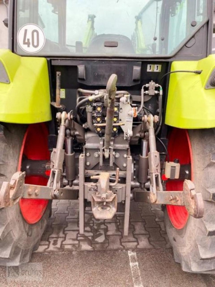 Farm tractor CLAAS axos 320 mit stoll frontlader