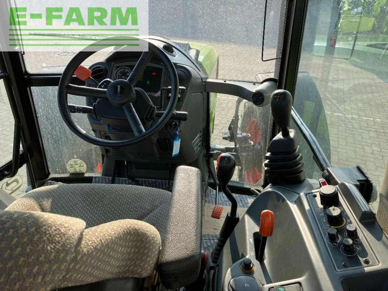 Farm tractor CLAAS axos 340 cx