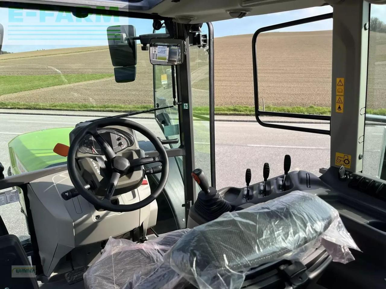 Farm tractor CLAAS axos 3.105