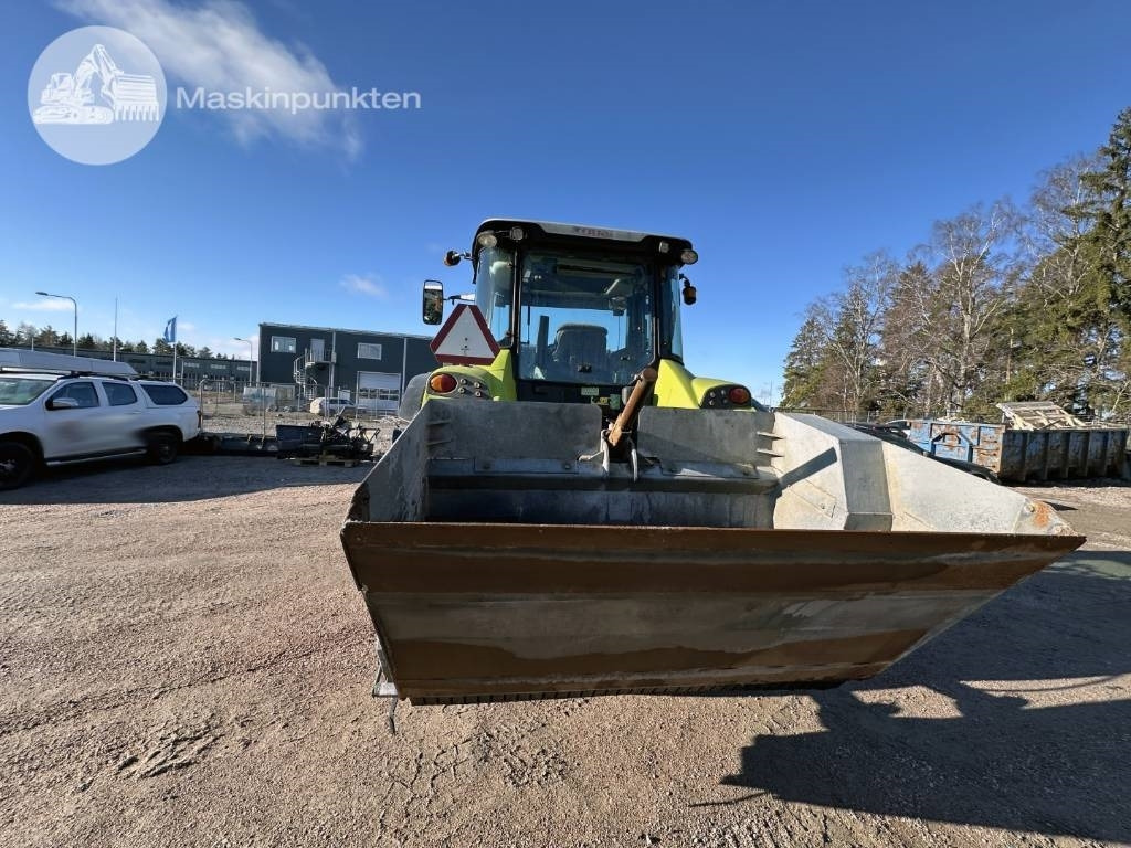 Farm tractor Claas Arion 410