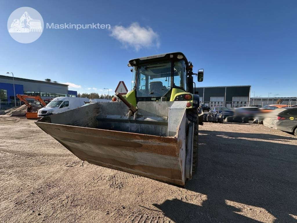 Farm tractor Claas Arion 410