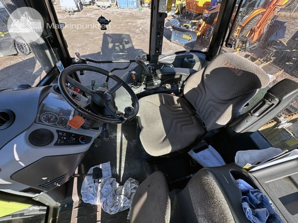 Farm tractor Claas Arion 410