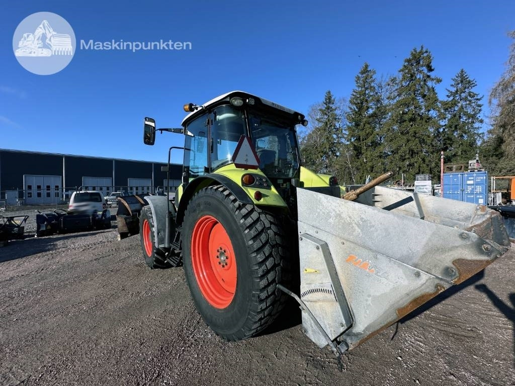 Farm tractor Claas Arion 410