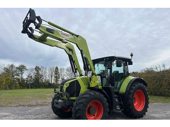 Farm tractor Claas Arion 640 cis, lucht, frontlader