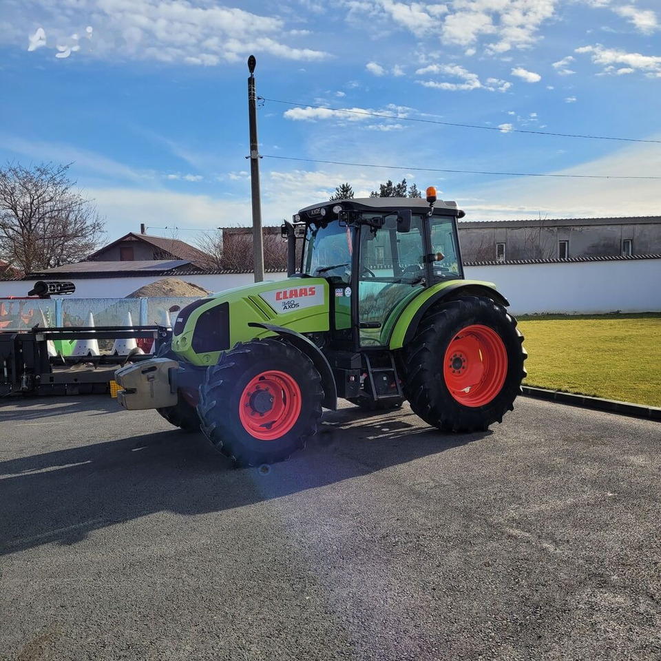 Farm tractor Claas Axos 340