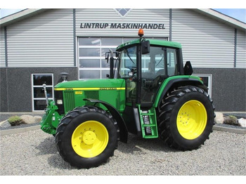 Farm tractor John Deere 6910 TLS med NY frontlift 