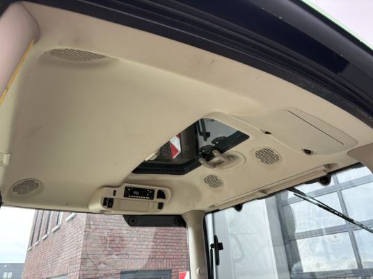 Farm tractor John Deere 6r215