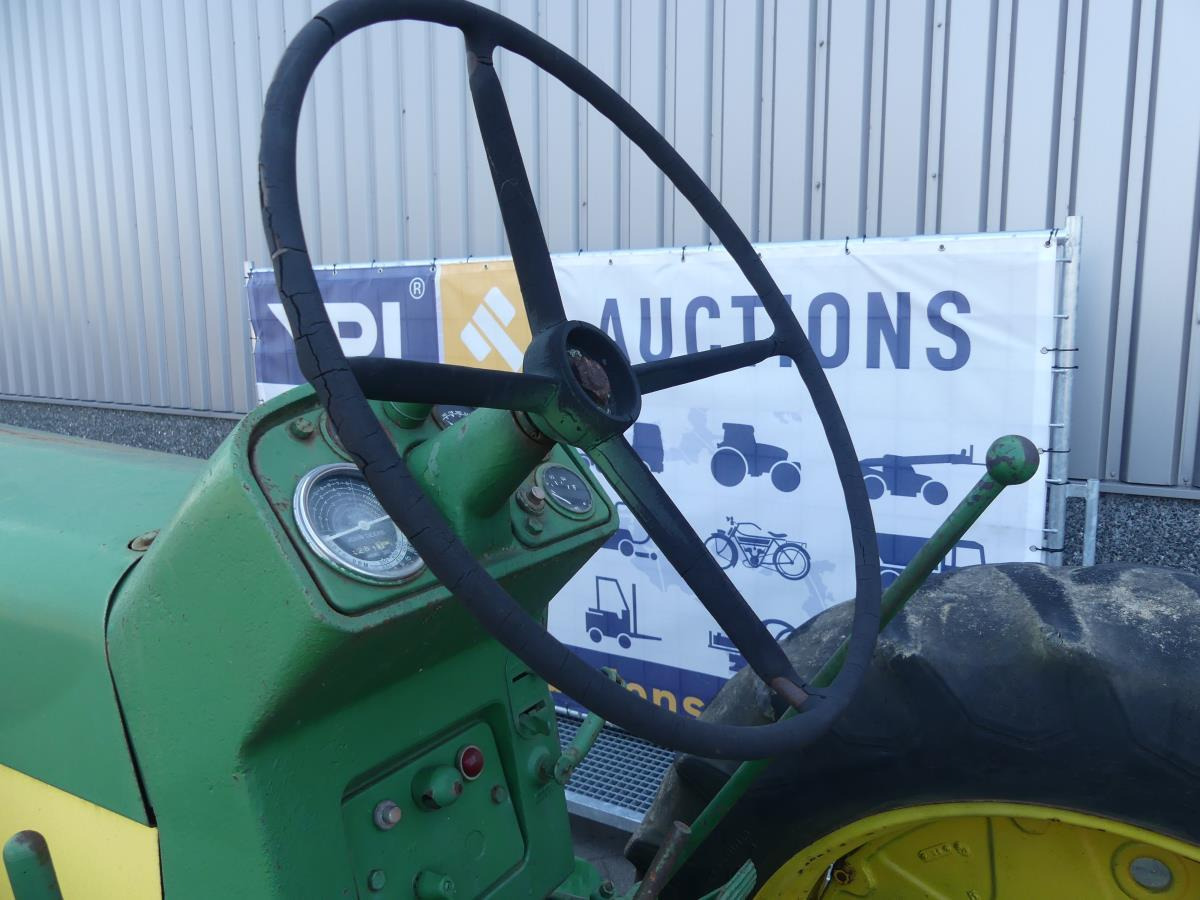 Farm tractor John-Deere 730