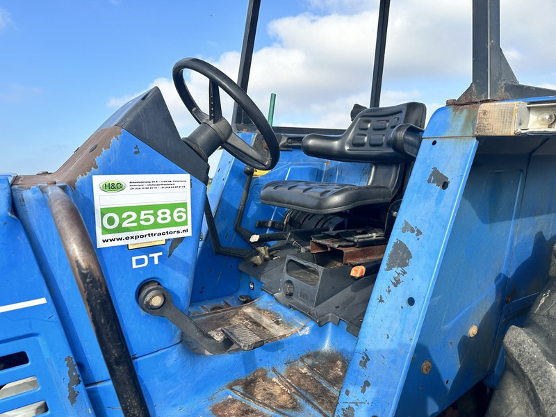Farm tractor New Holland 110-90 DT