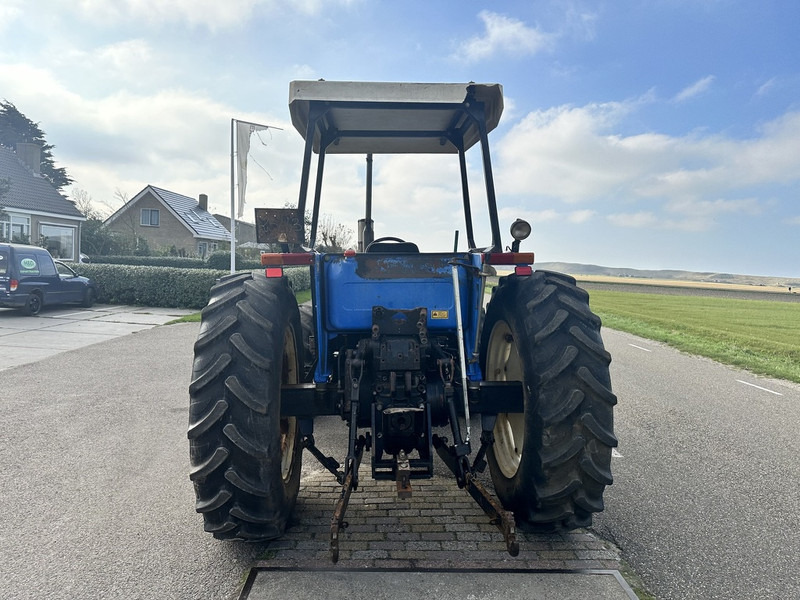 Farm tractor New Holland 110-90 DT