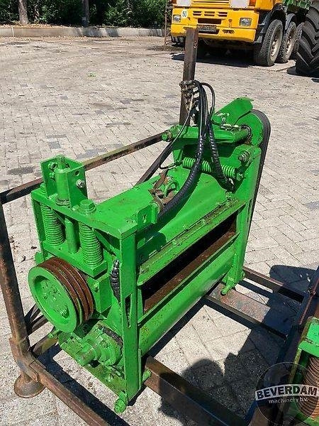 Harvester attachment John Deere Korrelkneuzers