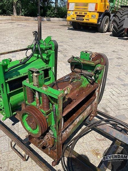 Harvester attachment John Deere Korrelkneuzers