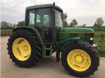 Farm tractor John Deere 6400: picture 1