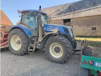 Farm tractor New Holland t 7040: picture 1