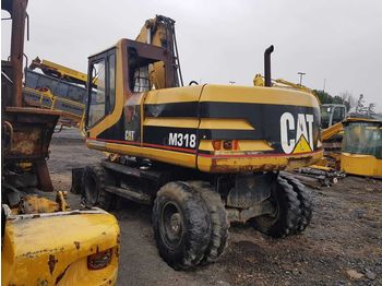 Wheel excavator CATERPILLAR M318: picture 1