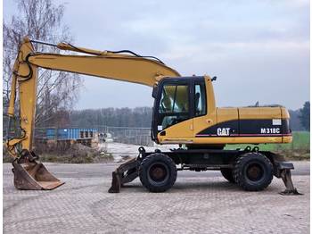 Wheel excavator Caterpillar M318C: picture 1