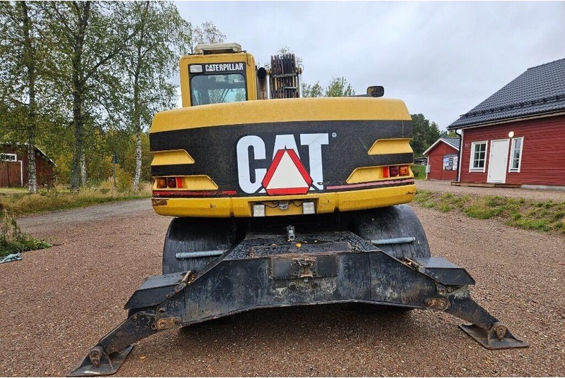 Wheel excavator Caterpillar M312 Engcon EC20 tiltrotator