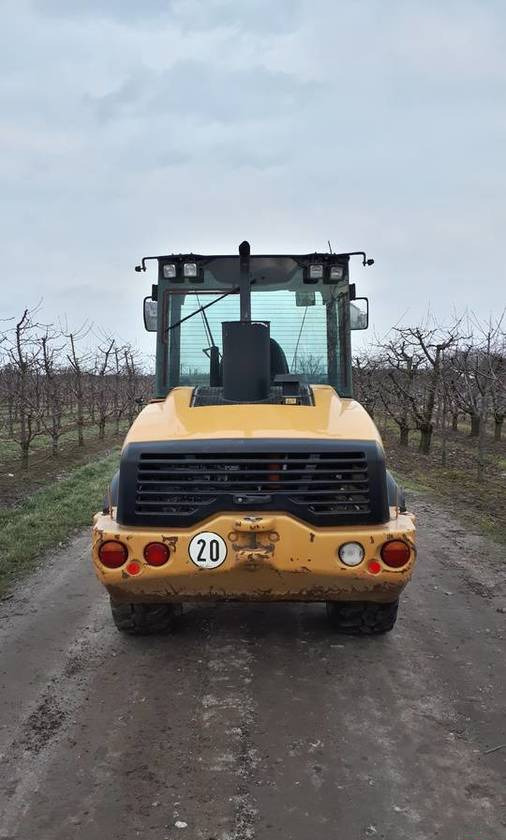 Wheel loader Ładowarka Caterpillar 906H widły + łyżka