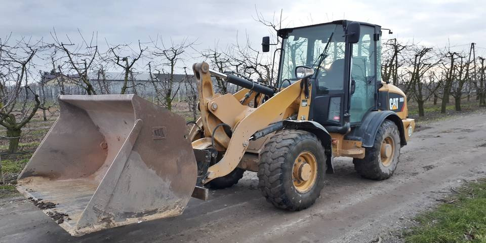 Wheel loader Ładowarka Caterpillar 906H widły + łyżka