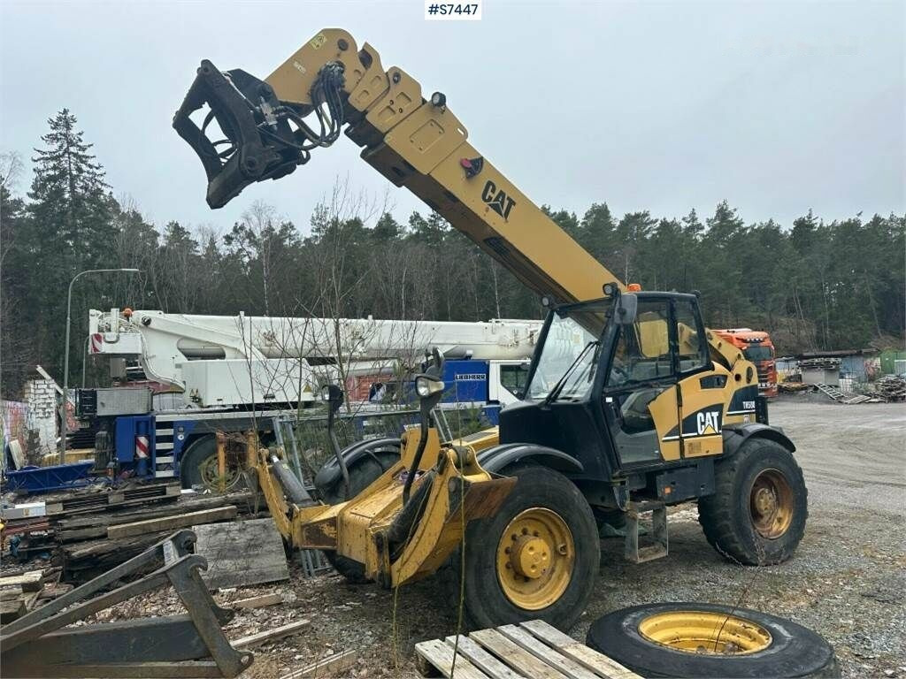 Leasing of Caterpillar TH580H Telescopic loader with crane arm Caterpillar TH580H Telescopic loader with crane arm: picture 1