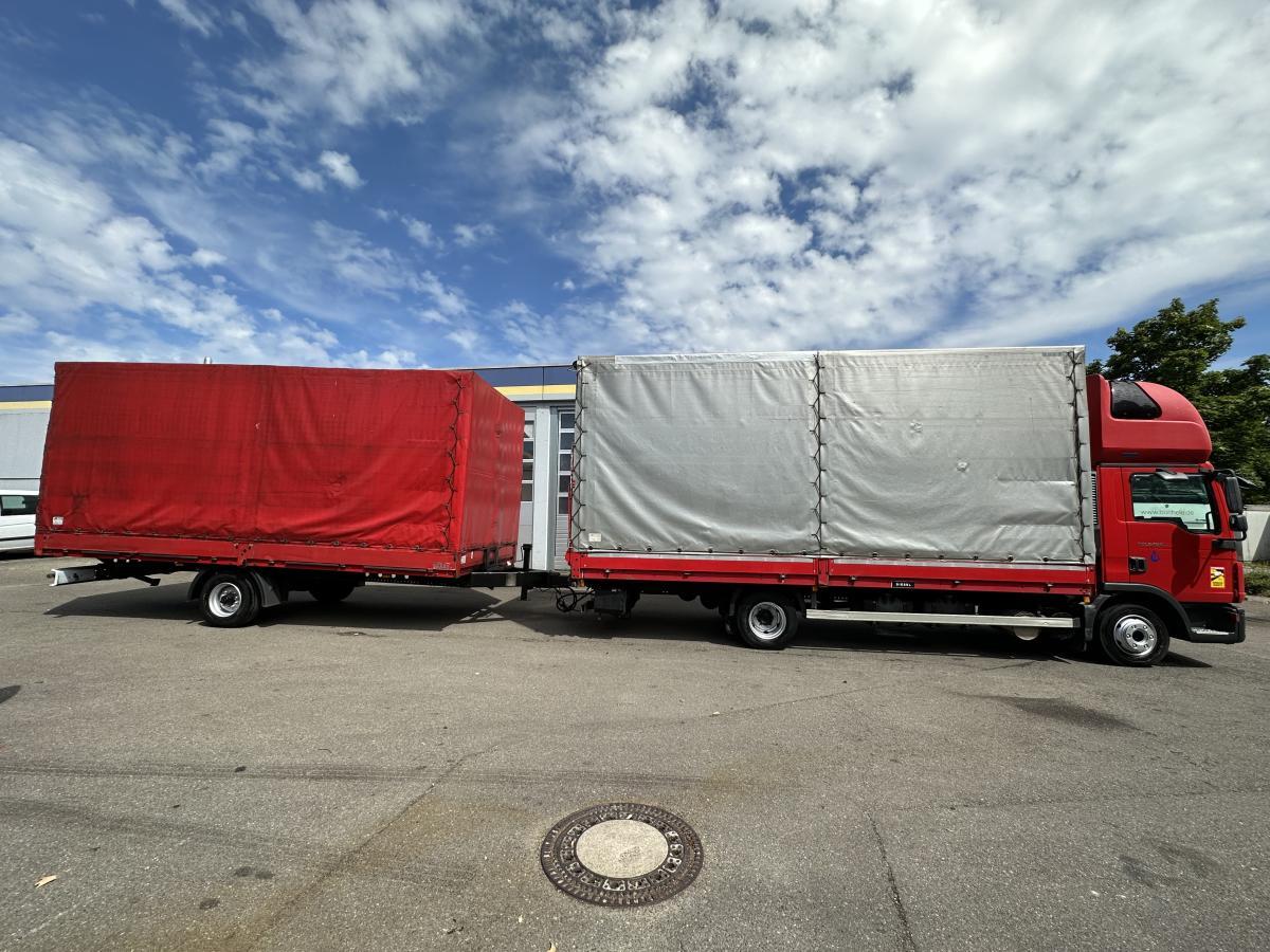 Curtainsider truck MAN MAN 8.180 Zug mit SAXAS 1-Achs Anh Topsleeper