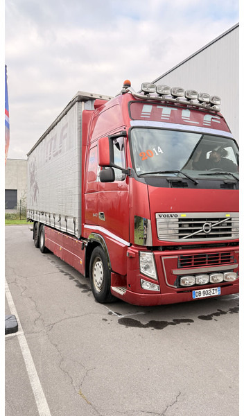 Curtainsider truck Volvo FH13 540