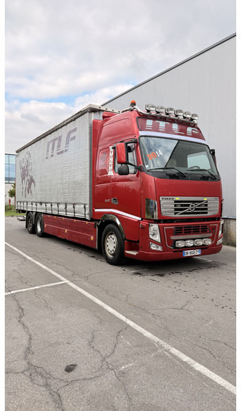 Curtainsider truck Volvo FH13 540