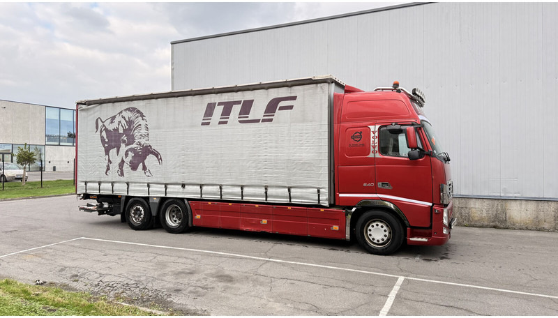 Curtainsider truck Volvo FH13 540