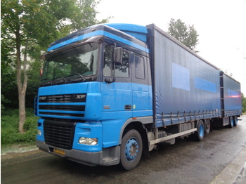 Curtainsider truck DAF XF95-380 6X2: picture 1