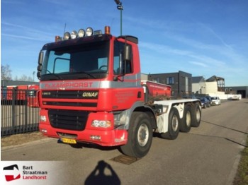 Container transporter/ Swap body truck Ginaf X 4243 TS 8x4 manual met kettingsysteem en kippercontainer: picture 1