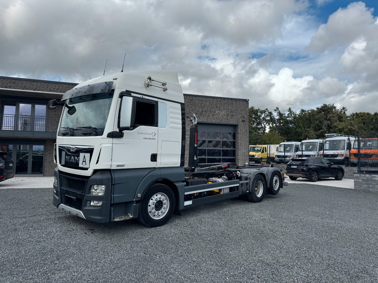 Hook lift truck MAN TGX 26.520 D38 Abrollkipper  Multilift