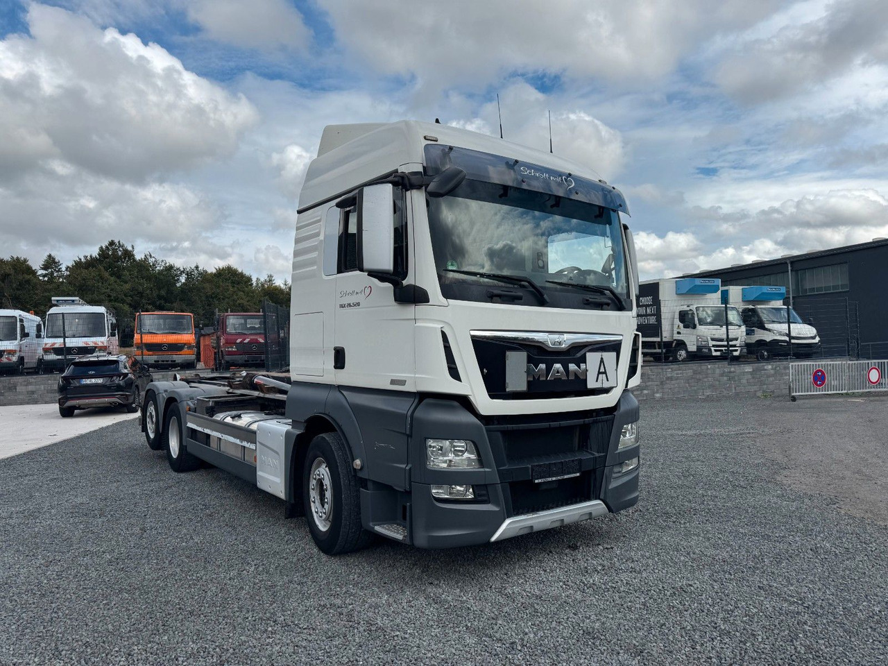 Hook lift truck MAN TGX 26.520 D38 Abrollkipper  Multilift