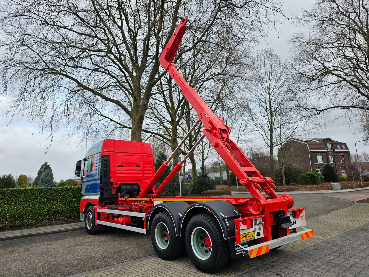 Hook lift truck MAN TGX 26.560 XLX 6X4