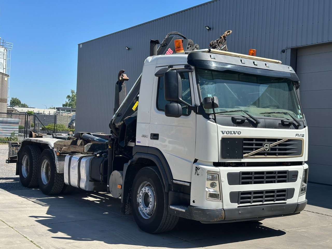 Hook lift truck Volvo FM12 380 Hiab 144E-3
