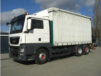 Curtainsider truck MAN 26440L TGX / Glastaransport / KRAN HMF2120: picture 1