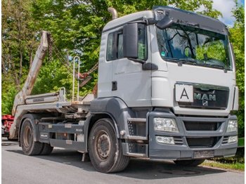 Skip loader truck MAN TGS 18.360 4x2 Absetzer Meiller AK12: picture 1