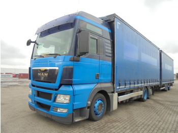 Curtainsider truck MAN TGX 24-400 6X2: picture 1