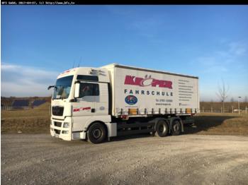 Container transporter/ Swap body truck MAN TGX 26.440 6x2-2 LL Schalter Fahrschulausstattun: picture 1