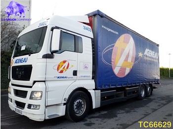 Curtainsider truck MAN TGX 440 Euro 4: picture 1